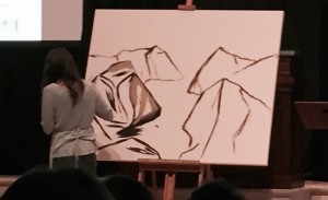 Through several worship services, an artist worked on a piece related to the theme. Notice how stark it looked at first.