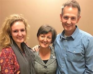 Congratulations to member Debbie Lord (middle), here with her daughter Emily and husband John, who passed the last step toward her PhD. today.