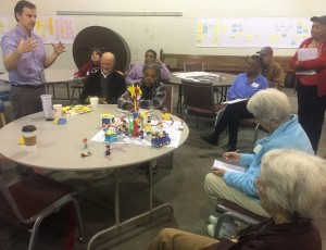 Brent Johnson, a member of the team that imagined Caldwell as a 'lighthouse," explains their prototype. Look below for video link.